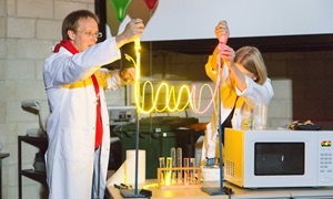 Dr Chrism Smith performing science experiment