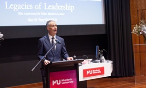 The Hon Dr Tony Buti MLA presenting the 50th edition of the Sir Walter Lecture