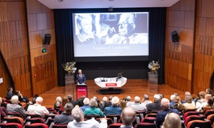 The Hon Dr Tony Buti MLA presenting the 50th edition of the Sir Walter Lecture